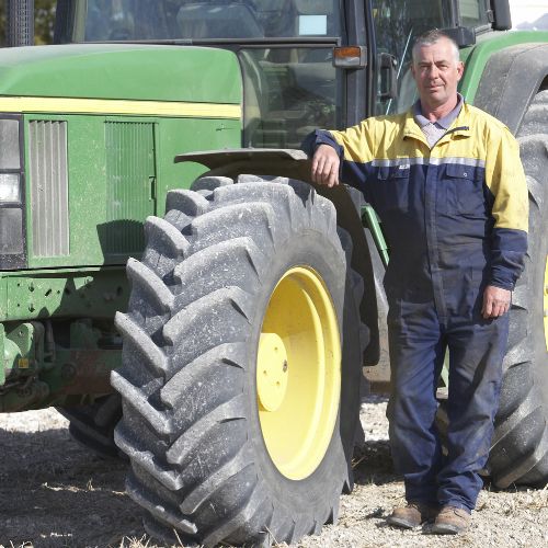 Tractor driver in trees & plants nursery